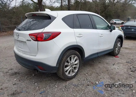 2013 Mazda Cx-5 Grand Touring z USA, uszkodzony, nr VIN JM3KE2DE9D0106603